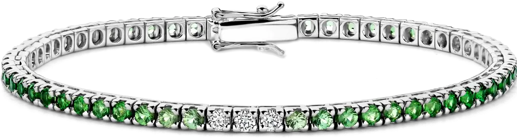 White gold tennis bracelet fully set with diamonds and emeralds